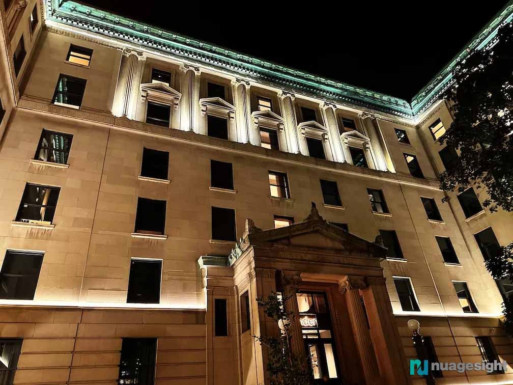 Side view of large buildings lighting at night